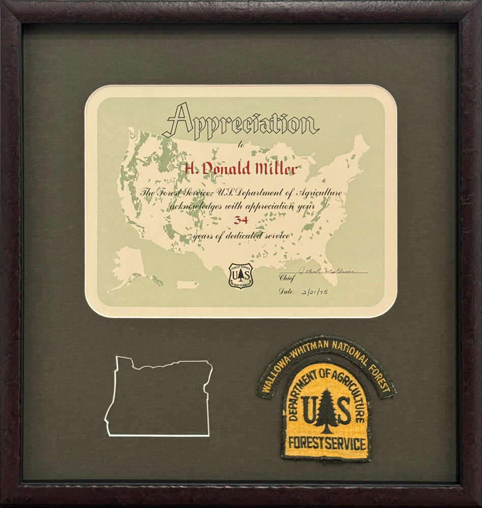 A framed certificate from the USFS to H. Donald Miller
